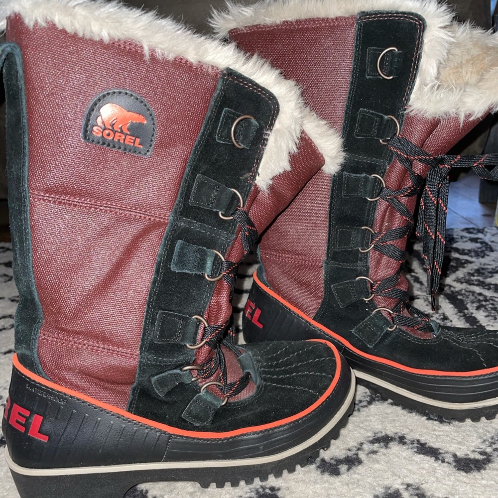 Maroon, black, and orange Sorel Winter Boots